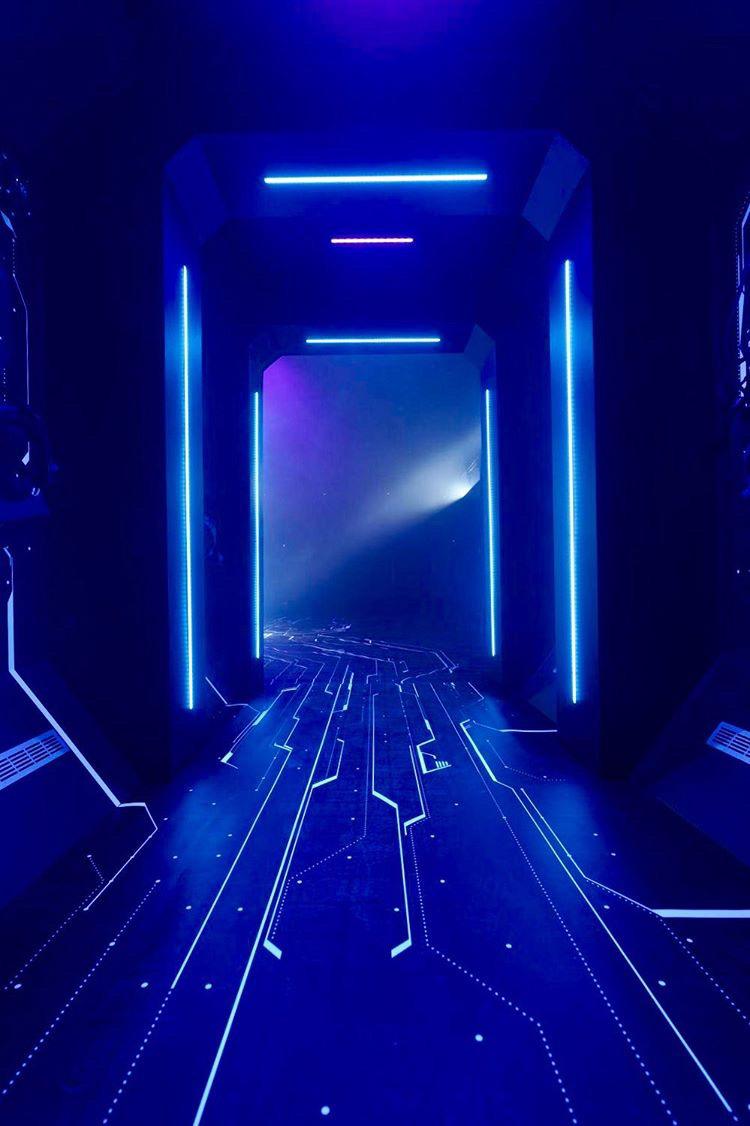 Entrance corridor with light lines and circuit floor graphics